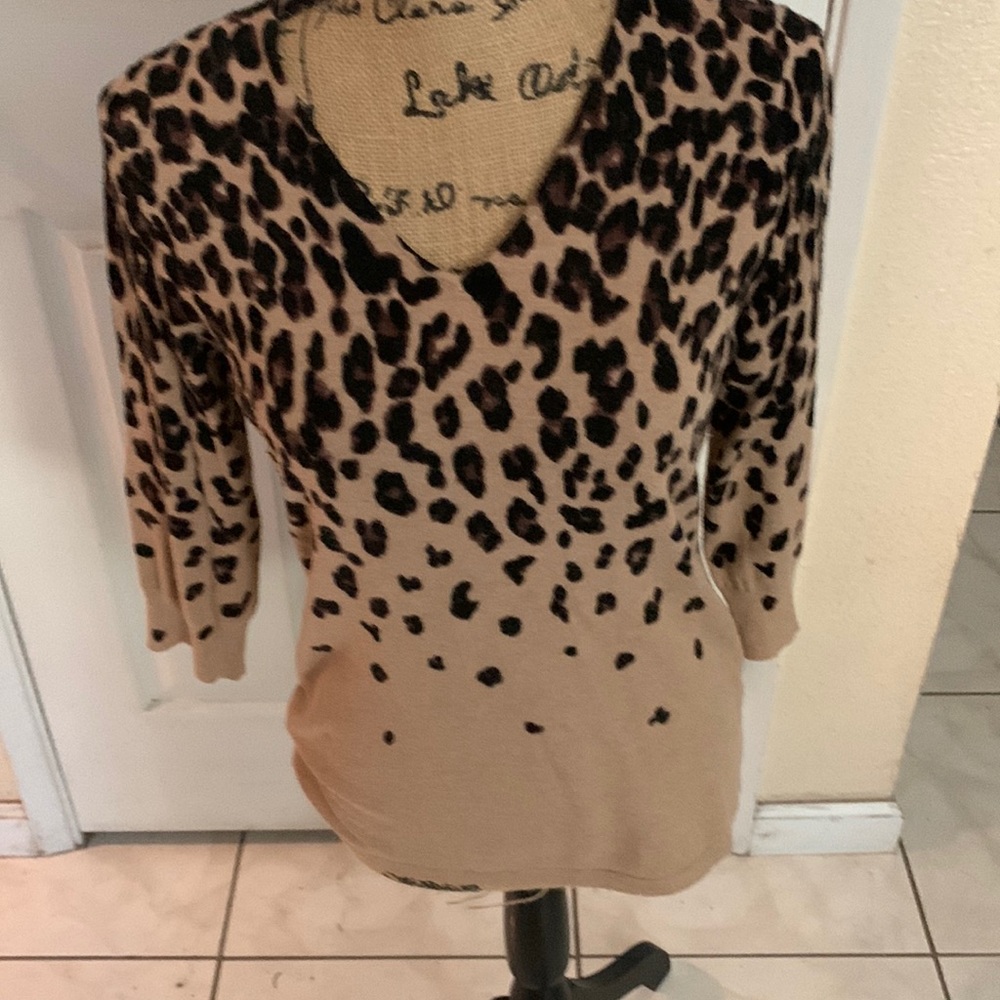 Dress barn sweater with animal print to fade